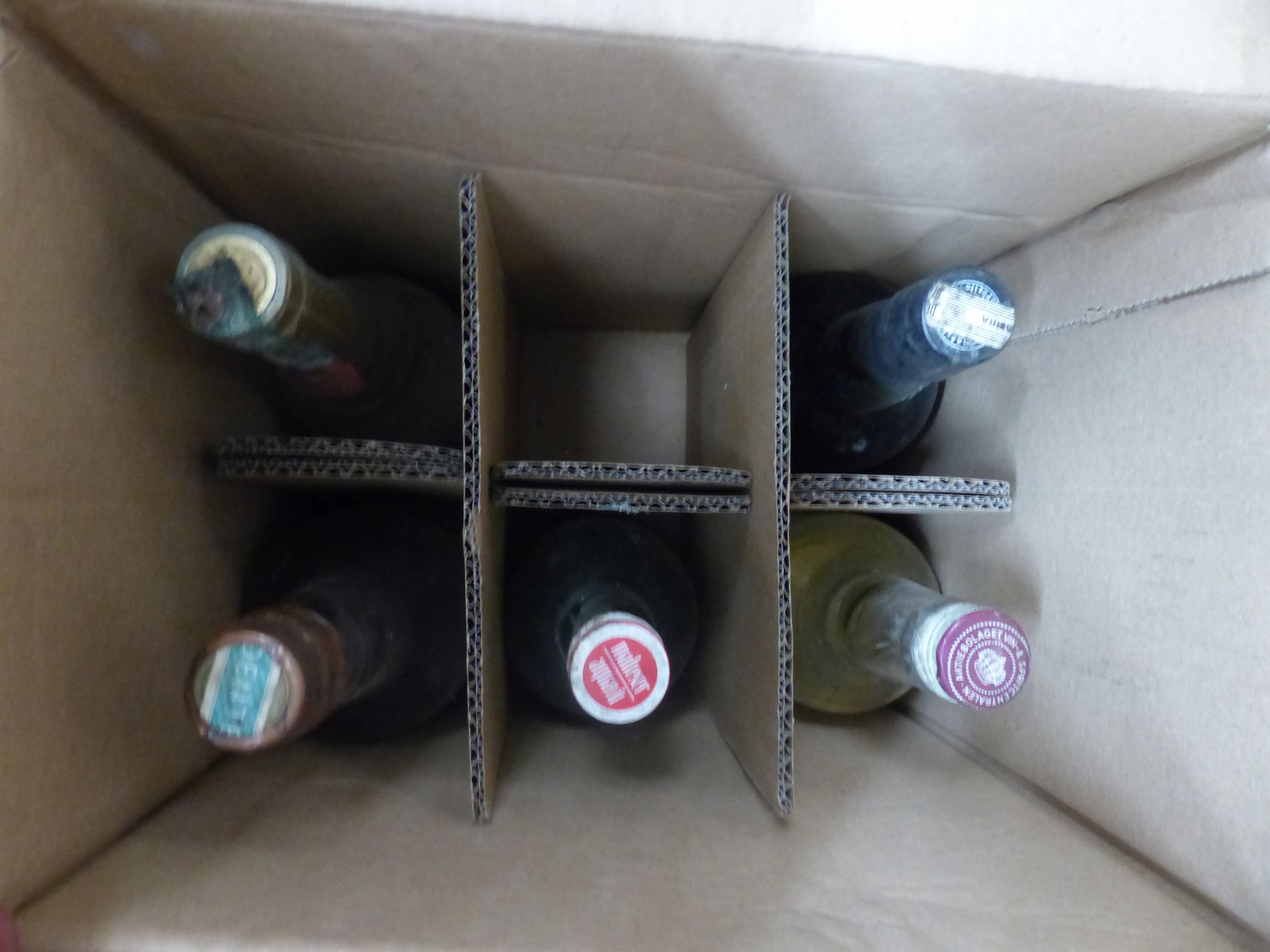 Approximately 74 bottles of assorted wines and spirits including Cahors 1978, Chateau du Cricastin 1979, etc.